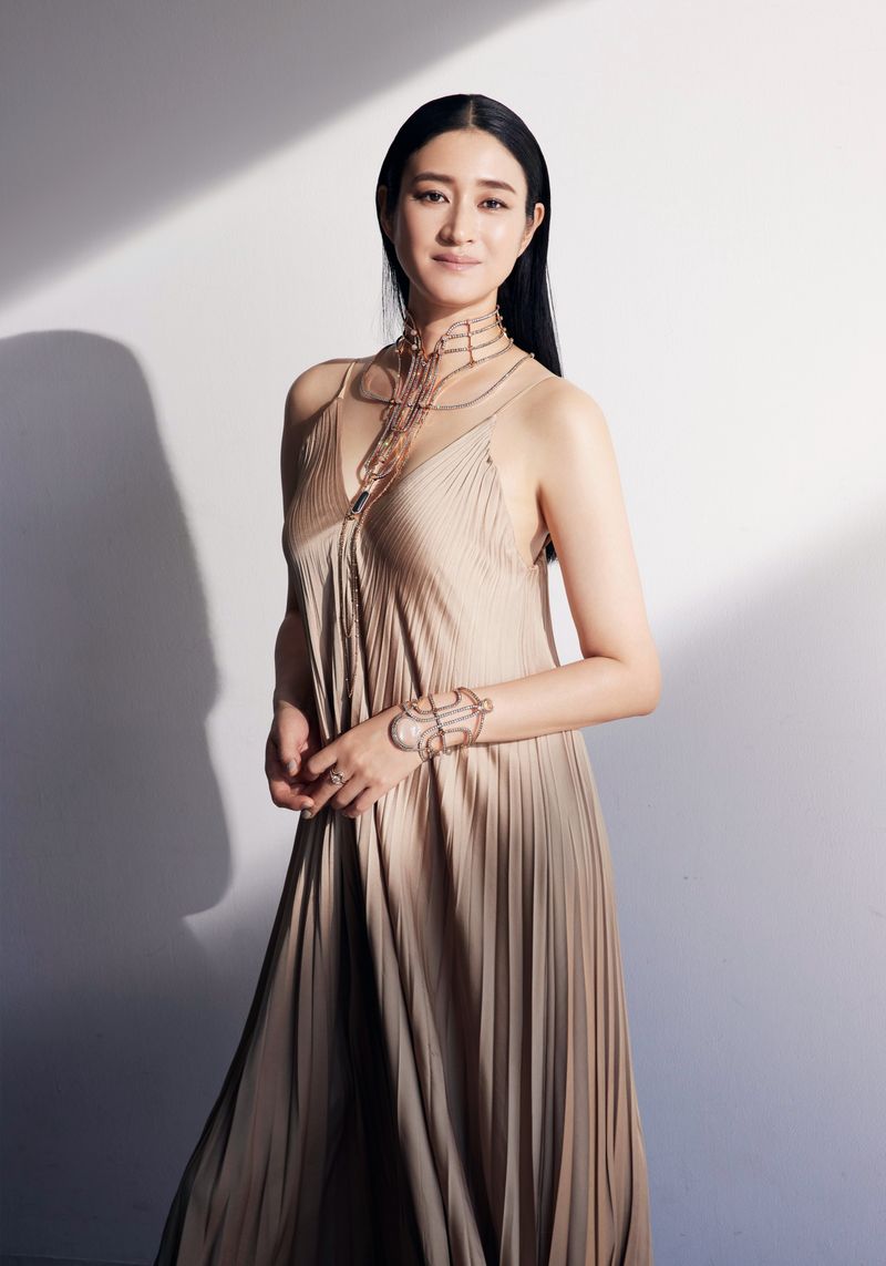 Koyuki — pleated dress portrait