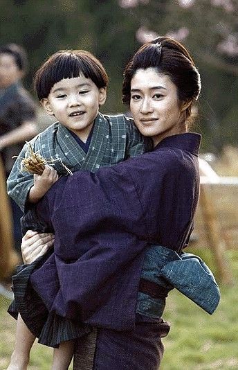 Koyuki — film still, with child
